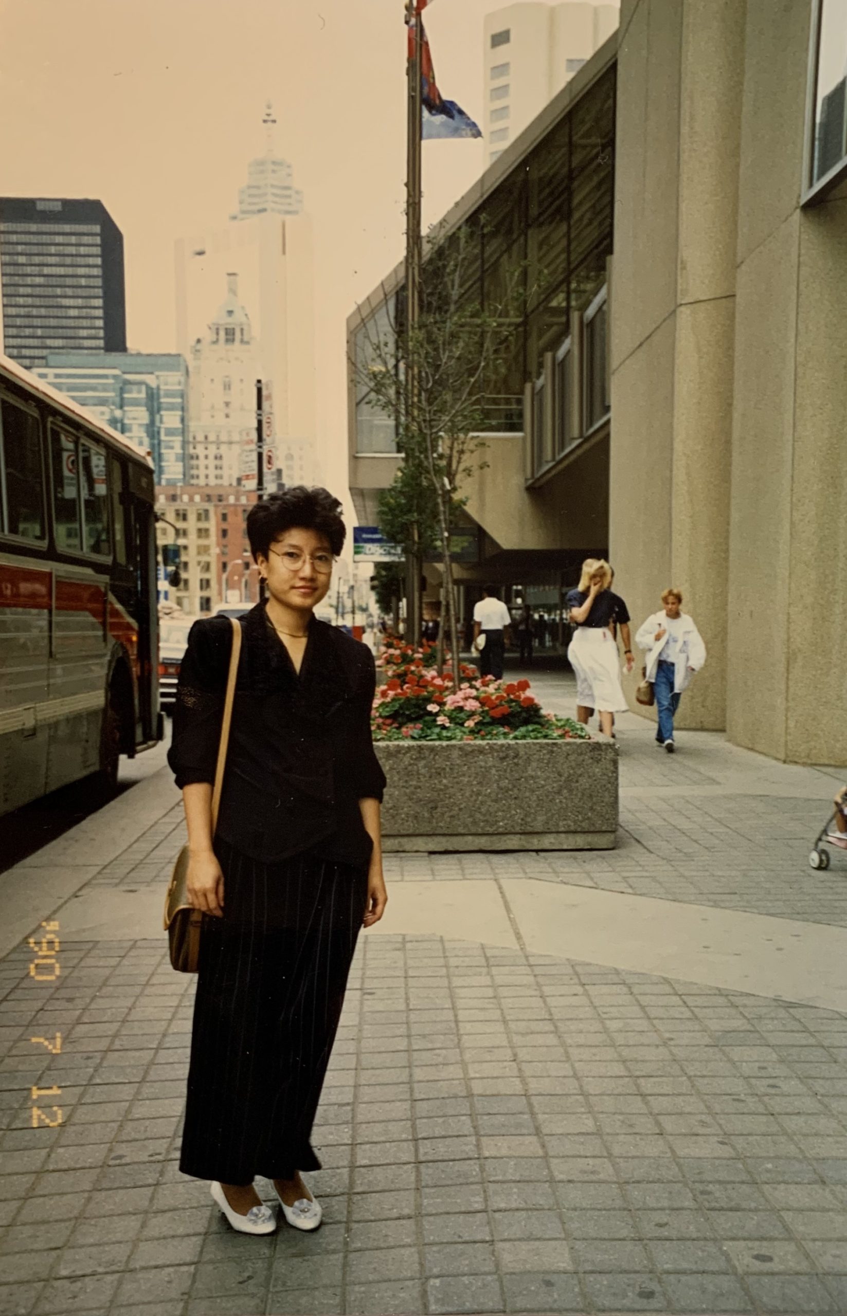 photo of dr. suki hon's mom when she first arrived in toronto in the 90s near harbourfront